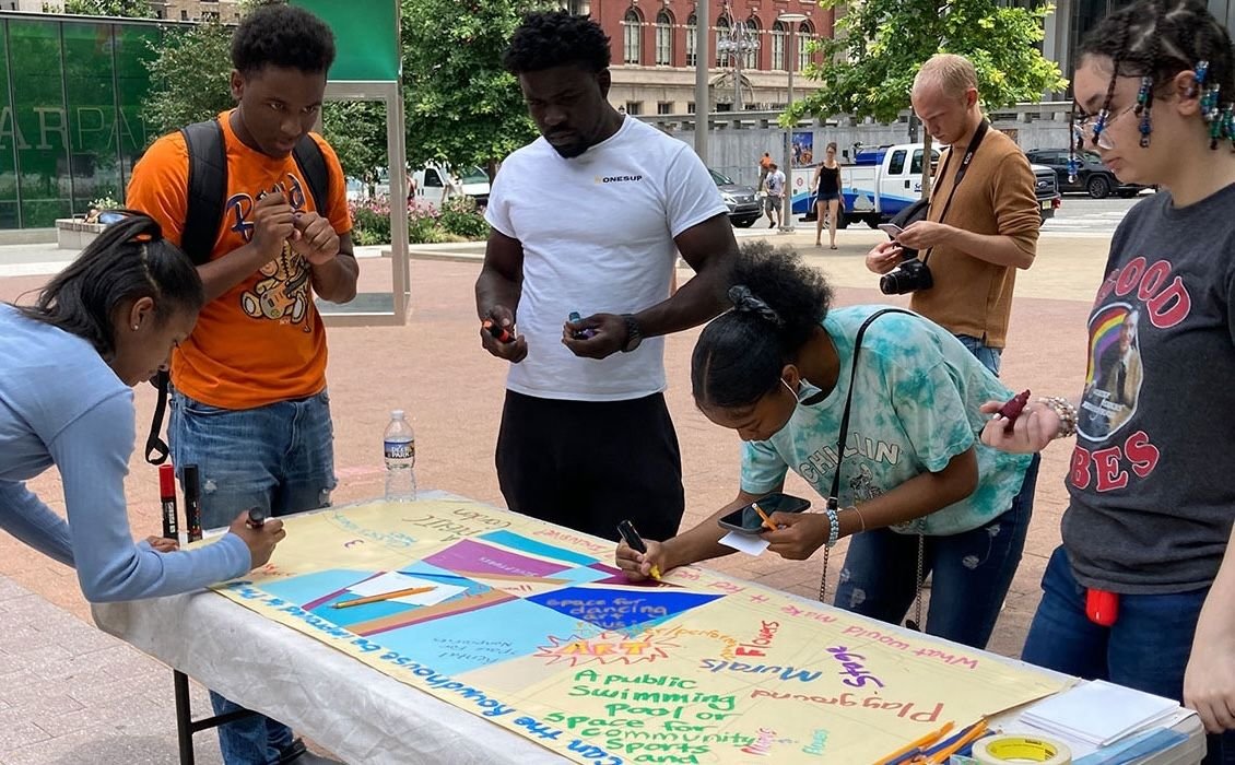 Young people taking part in a community planning activity